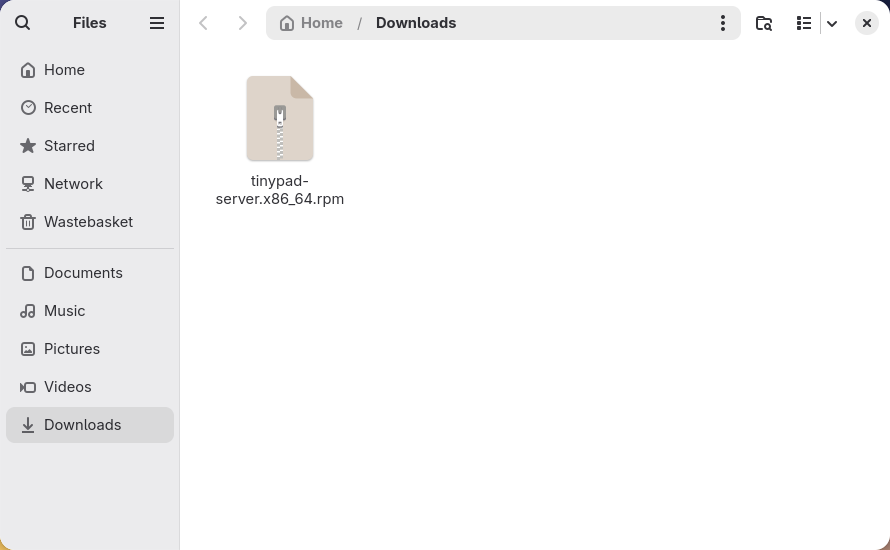 The Ilopad .rpm package shown in the Files app Downloads folder